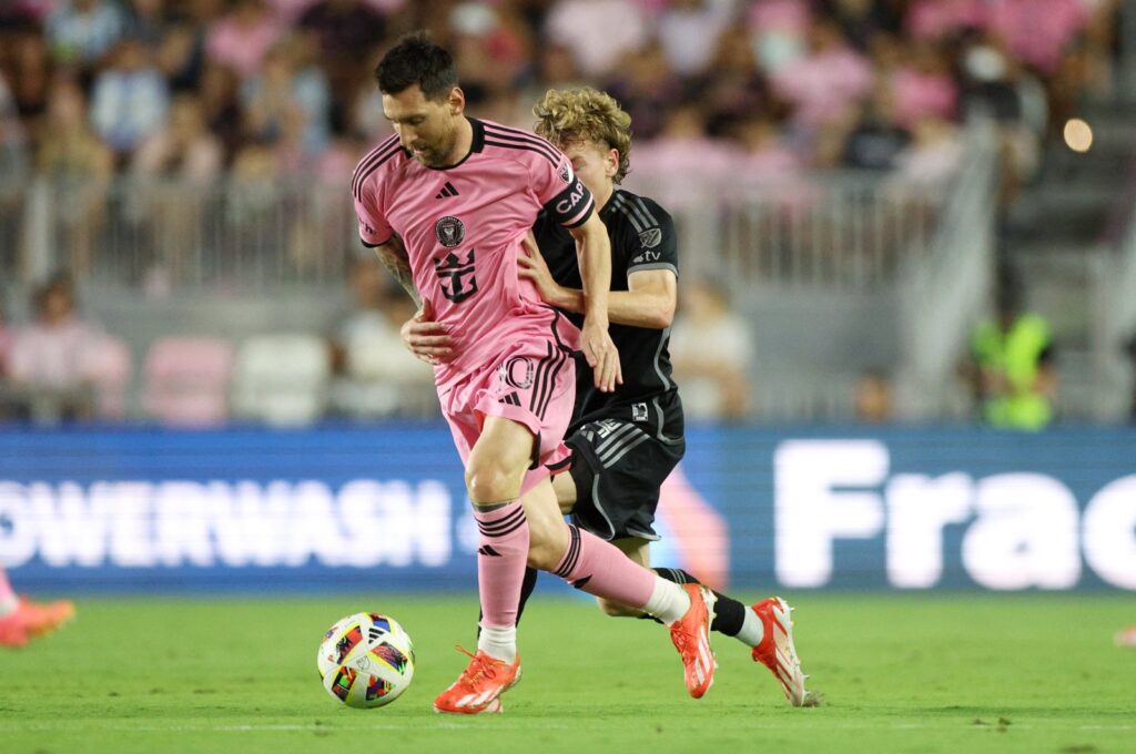 Inter Miami's Lionel Messi (L) and Nashville's Jacob Shaffelburg battle for the ball in the first half at Chase Stadium, Fort Lauderdale, Florida, U.S., April 20, 2024. (Reuters Photo)