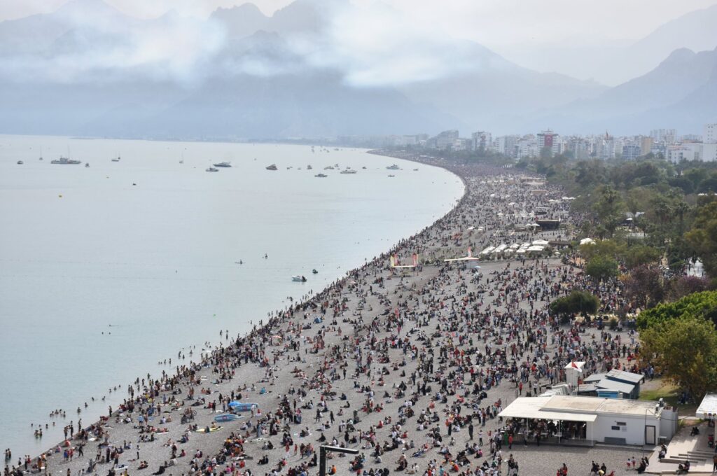 People are seen on a beach during the National Sovereignty and Children's Day in the Mediterranean tourism hot spot Antalya, southern Türkiye, April 23, 2024. (AA Photo)