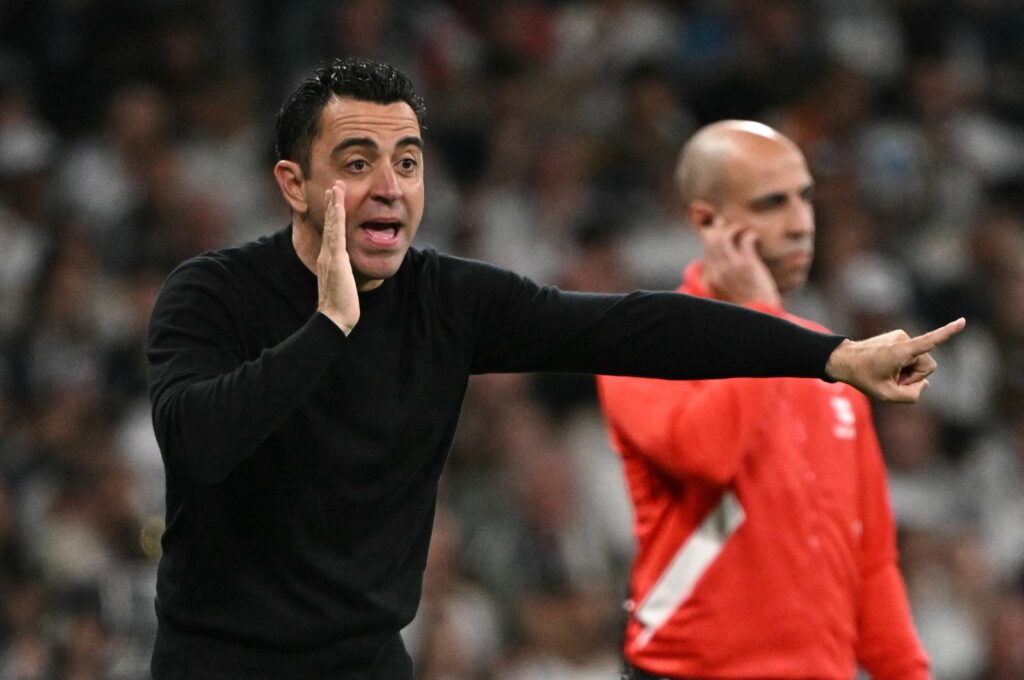 Barcelona's coach Xavi gestures on the touchline during the Spanish league football match against Real Madrid at the Santiago Bernabeu stadium, Madrid, Spain, April 21, 2024. (AFP Photo)