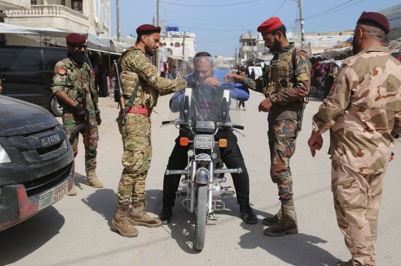 Turkish-backed Syrian National Army (SNA) set up checkpoints as they take extra security measures against PKK/YPG terrorists ahead of the Eid holiday in Tell Abyad, northern Syria, April 9, 2024. (AA Photo)