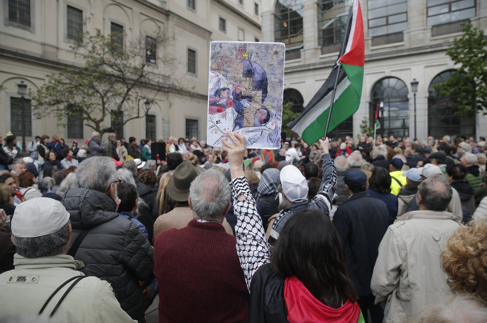 A prominent group of artists and intellectuals gathered in front of Reina Sofia Museum to express support for Palestine and say "no" to genocide and terrorism, Madrid, Spain, April 26, 2024. (AA Photo)