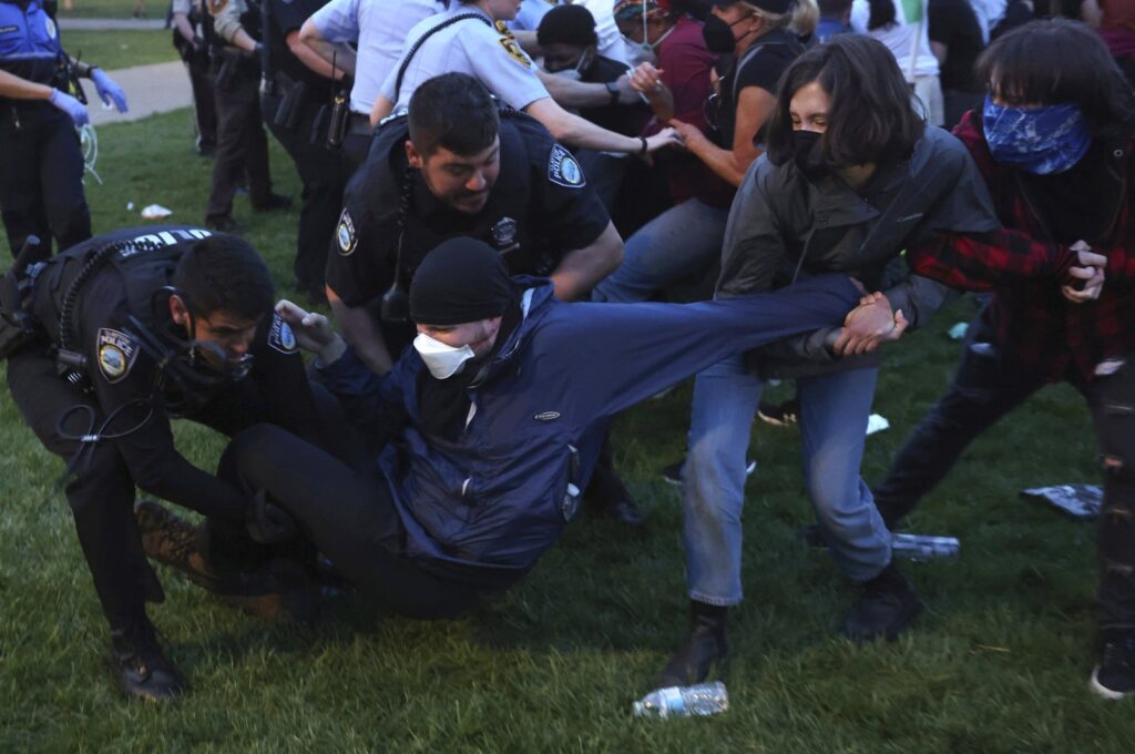 Police arrest protesters attempting to camp in support of Palestinians on Washington University's campus in St. Louis, U.S., April 27, 2024. (AP Photo)