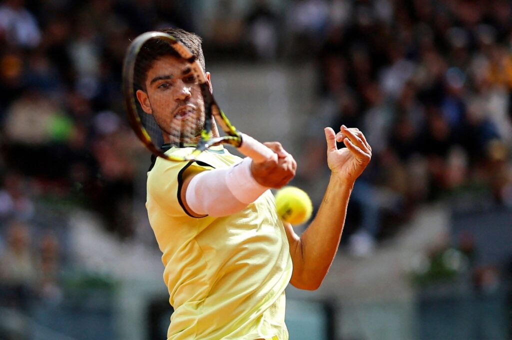 Spain's Carlos Alcaraz returns to Brazil's Thiago Seyboth Wild during the third round of the 2024 ATP Tour Madrid Open tournament tennis match at Caja Magica, Madrid, Spain, April 28, 2024. (AFP Photo)