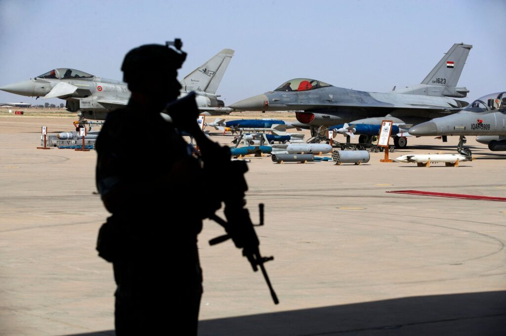 An Iraqi soldier stands guard an air show of military aircrafts at the Balad Air Base north of Baghdad, Iraq, April 24, 2024. (AFP Photo)