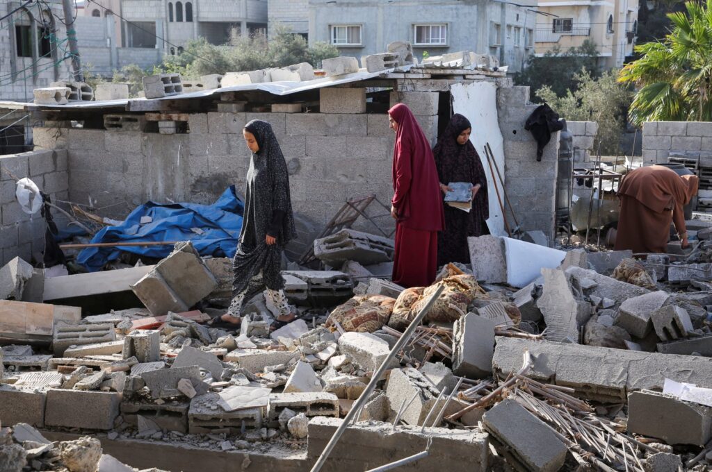 Women inspect a house damaged by an Israeli strike that lies in ruin, amid the ongoing conflict, Gaza Strip, Palestine, May 3, 2024. (Reuters Photo)