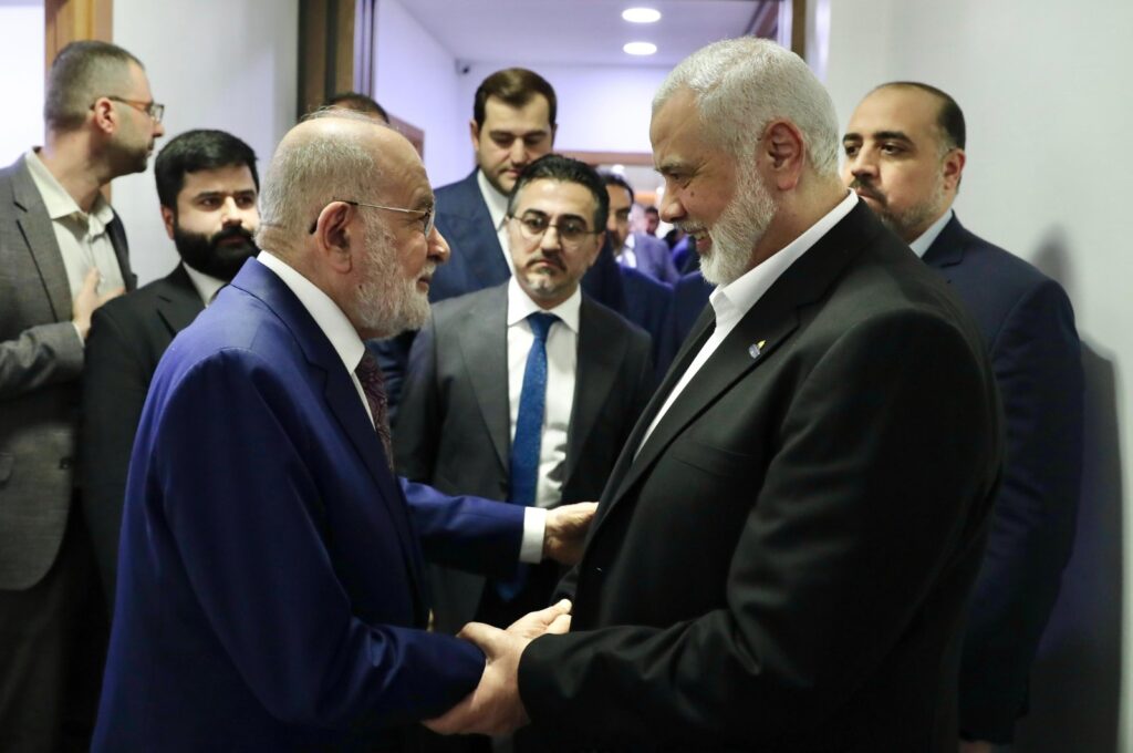 Felicity Party (SP) Chair Temel Karamollaoğlu (L) shakes hands with Ismail Haniyeh, Istanbul, Türkiye, May 3, 2024. (DHA Photo)