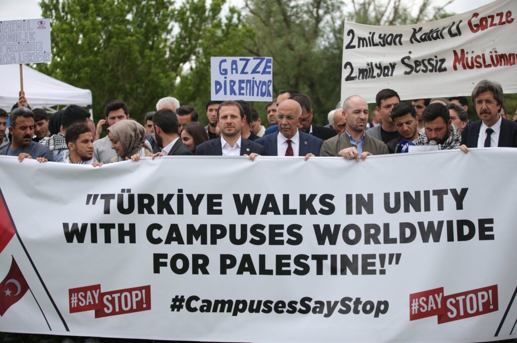 Protesters hold a banner in the Uludağ University in Bursa on Friday, May 4, 2024. (AA Photo)