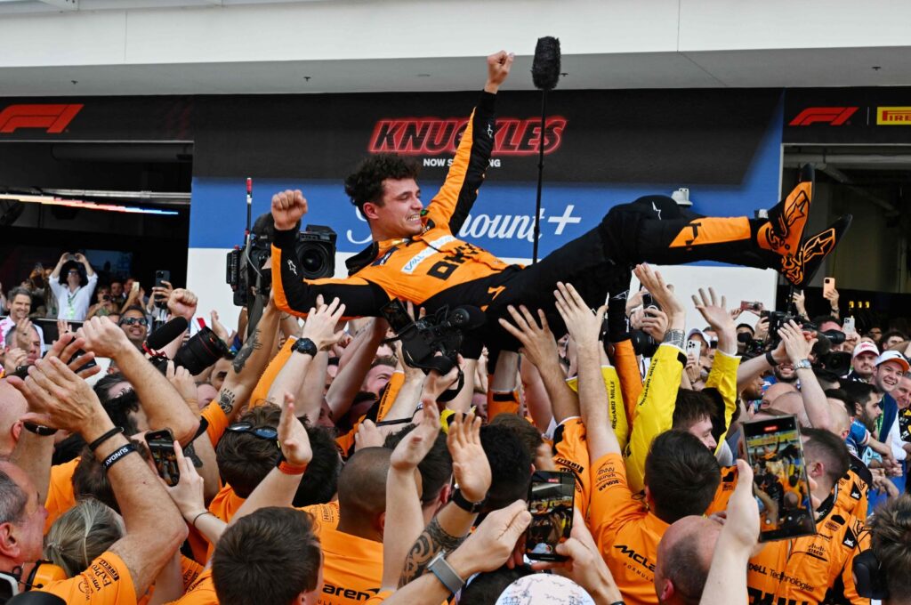 McLaren's Lando Norris is tossed in the air as his team celebrates his victory in the 2024 Miami Formula One Grand Prix at Miami International Autodrome, Miami Gardens, Florida, U.S., May 5, 2024. (AFP Photo)