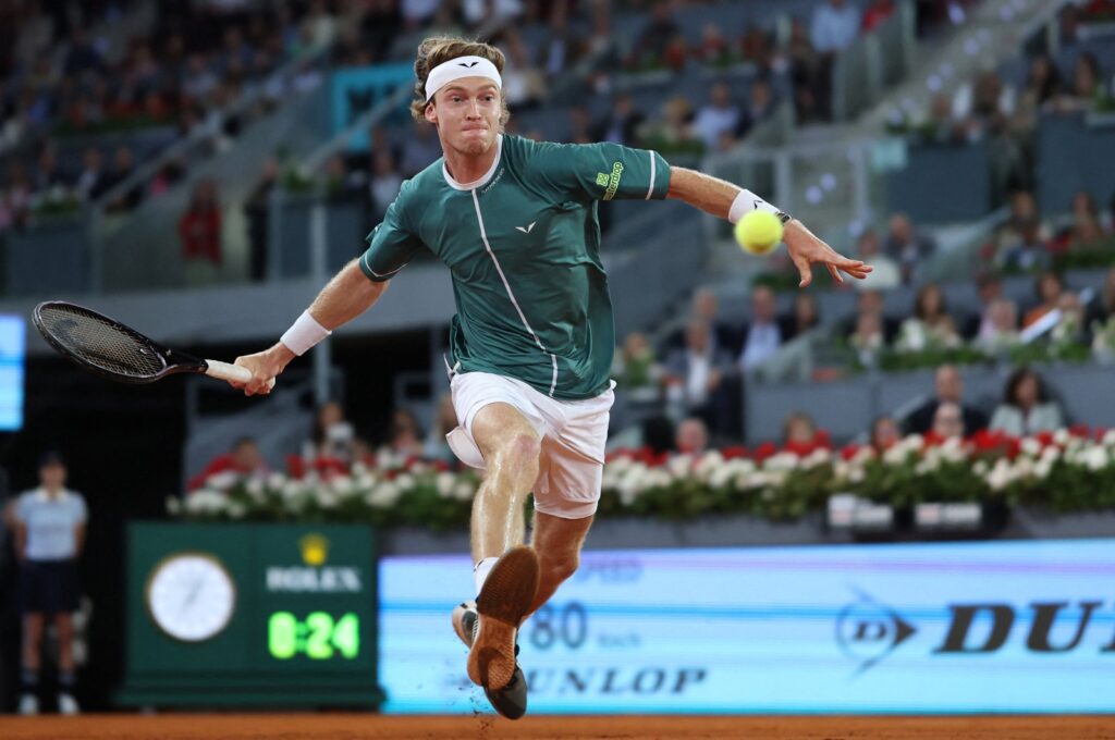 Russia's Andrey Rublev returns the ball against Canada's Felix Auger-Aliassime during the 2024 ATP Tour Madrid Open final, Caja Magica, Madrid, Spain, May 5, 2024. (AFP Photo)