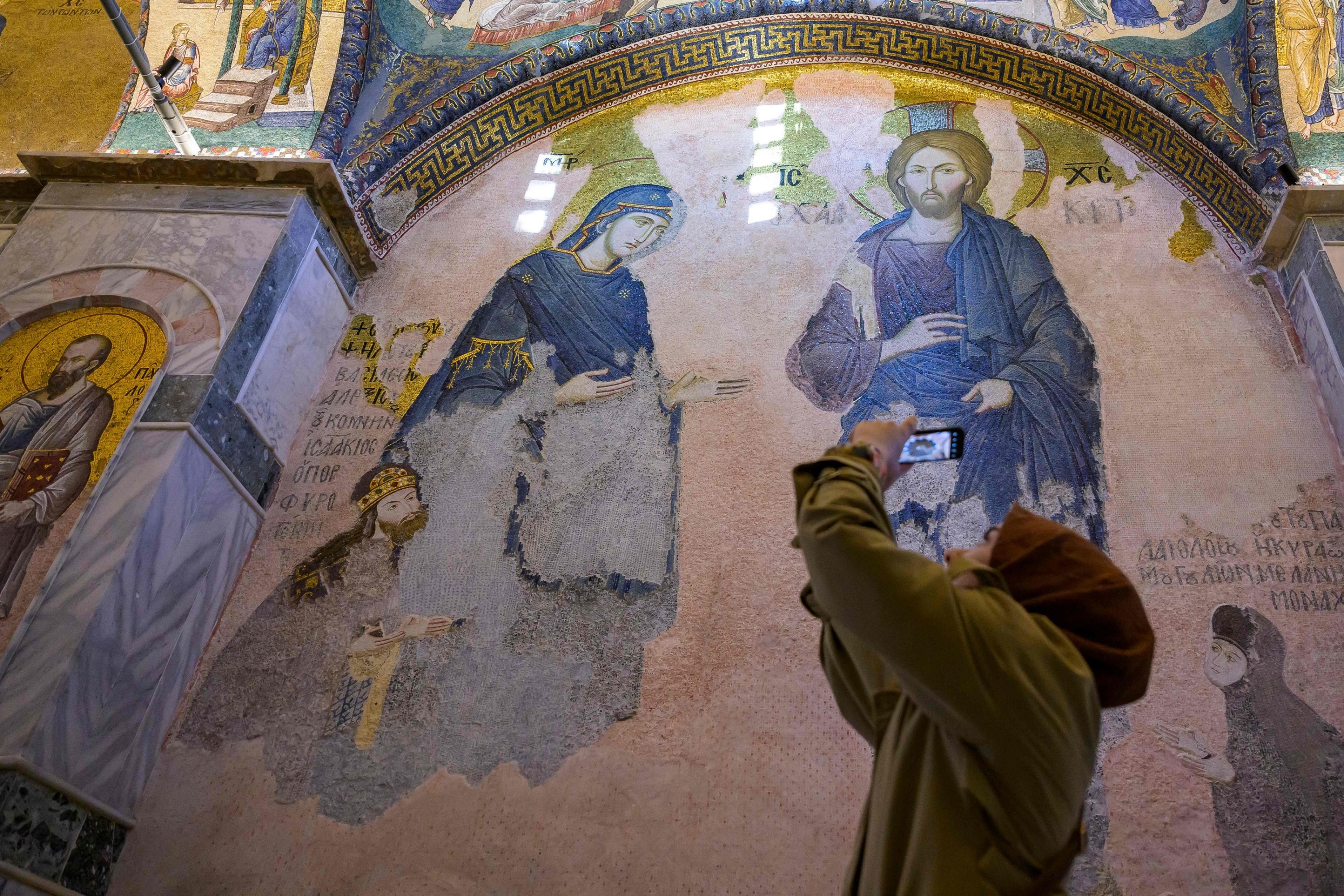 326700 A visitor takes a picture as she visits the Kariye Mosque, Istanbul, Türkiye, May 6, 2024. (AFP Photo)