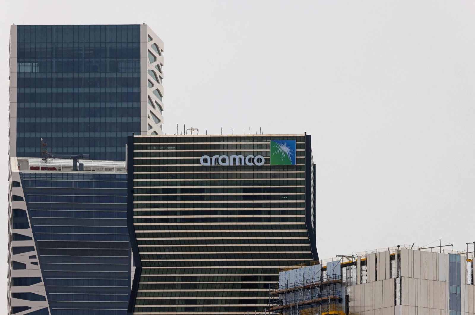 Aramco tower (C) is seen in the King Abdullah Financial District in Riyadh, Saudi Arabia, April 16, 2023. (AFP Photo)