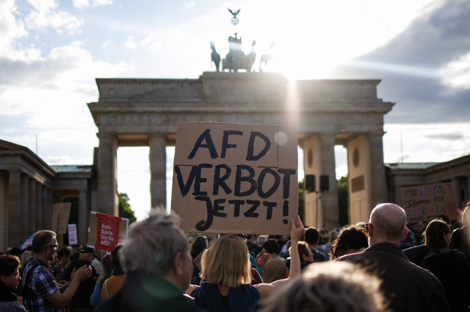 A participant holds a placard reading "AFD ban now!" referring to the far-right Alternative for Germany (AfD) party, during a rally in reaction to attacks on campaigning politicians in Germany, Berlin, Germany, May 5, 2024. (EPA Photo)