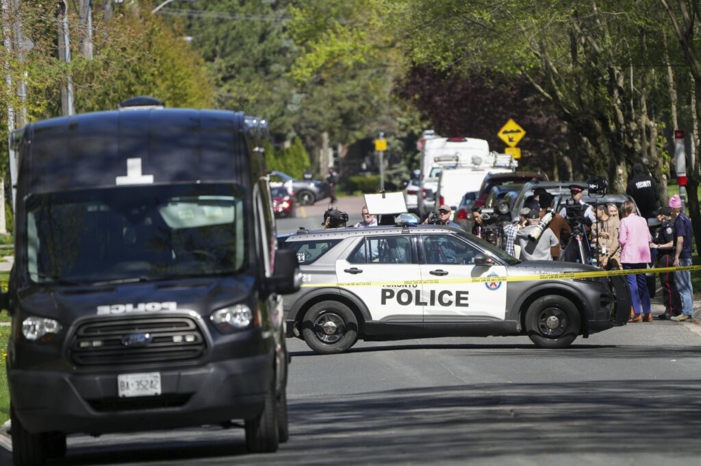 Media wait for a press conference as Toronto Police investigate a shooting outside rap mogul Drake's mansion in Toronto's Bridle Path neighborhood, May 7, 2024. (AP Photo)