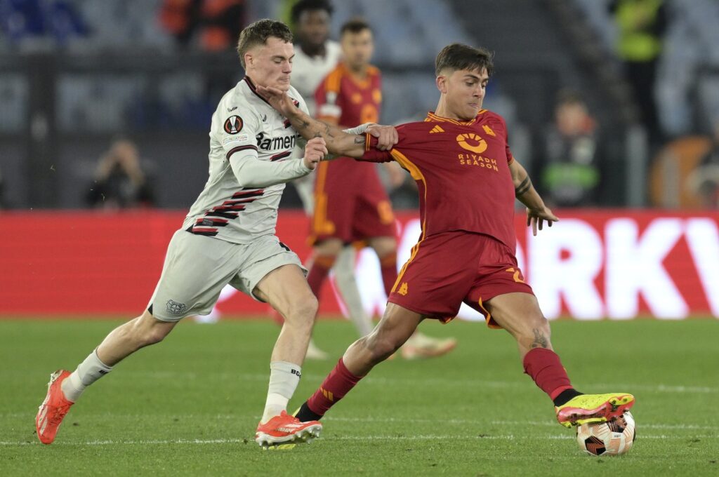 Roma's Paulo Dybala (R) drives the ball during the UEFA Europa League semifinal first leg match between AS Roma and Bayer 04 Leverkusen at the Olympic stadium, Rome, Italy, May 2, 2024. (AP Photo)