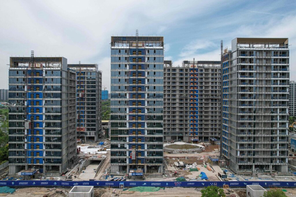 This picture shows residential buildings under construction by Chinese real estate developer Vanke in Hangzhou, eastern Zhejiang province, China, May 9, 2024. (AFP Photo)