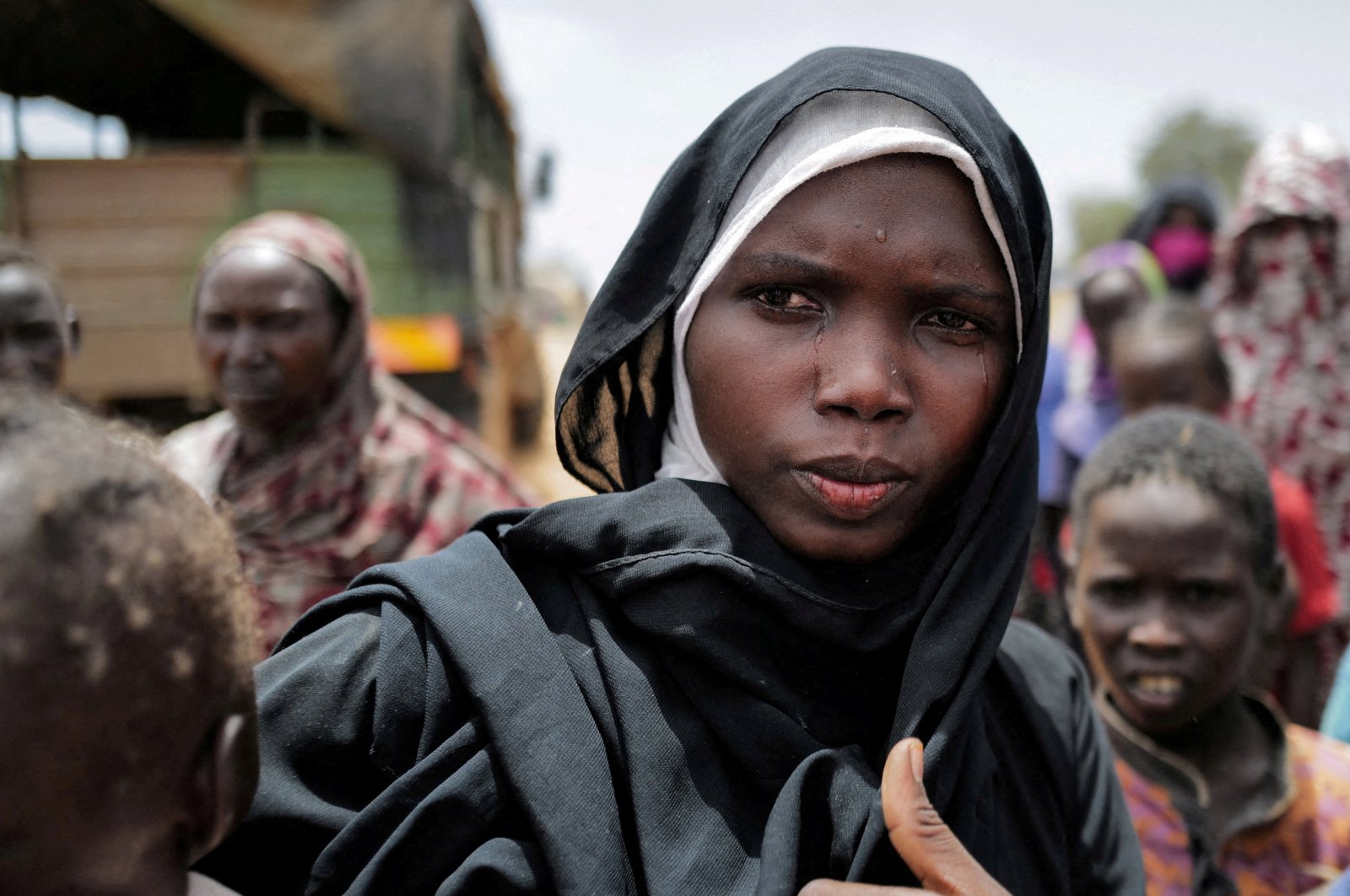 Amani Abdullah, 20, a Sudanese woman from el-Geneina in Sudan's Darfur region, mourns her husband, who was killed by the Rapid Support Forces (RSF), Adre, Chad July 25, 2023. (Reuters Photo)