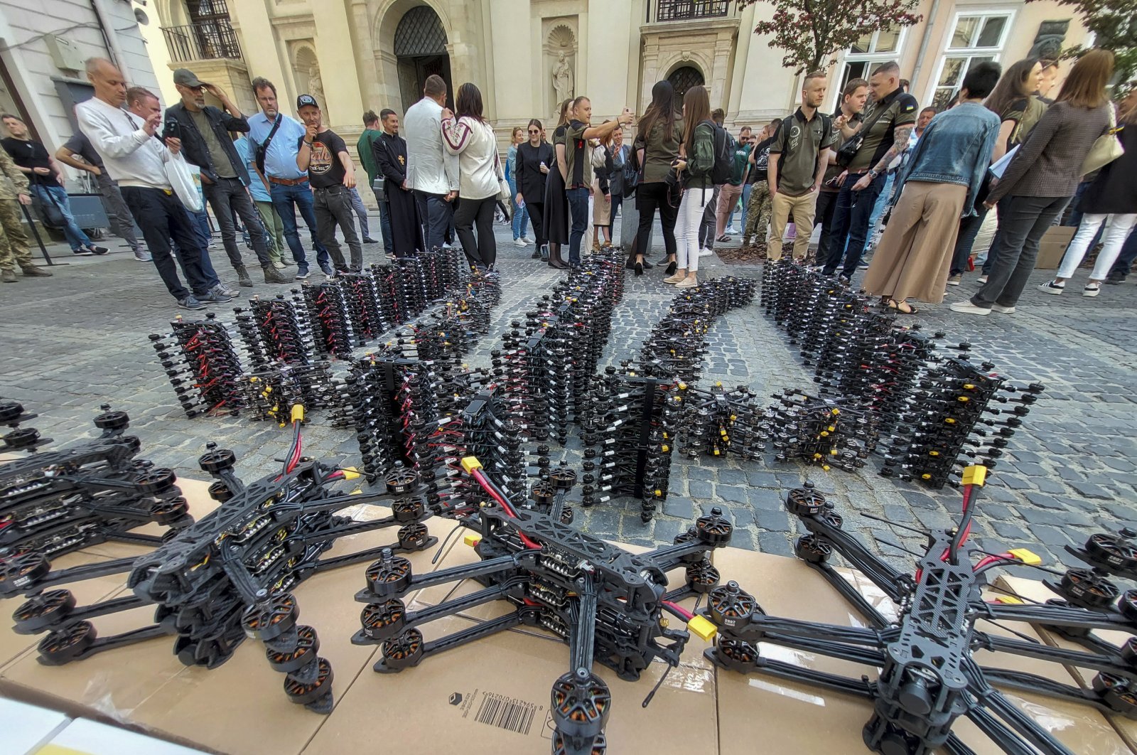 Volunteers arrange FPV (first-person view) drones to form the Ukrainian National Emblem before a ceremony to hand them to military units, in Lviv, Ukraine, May 10, 2024. (EPA Photo)