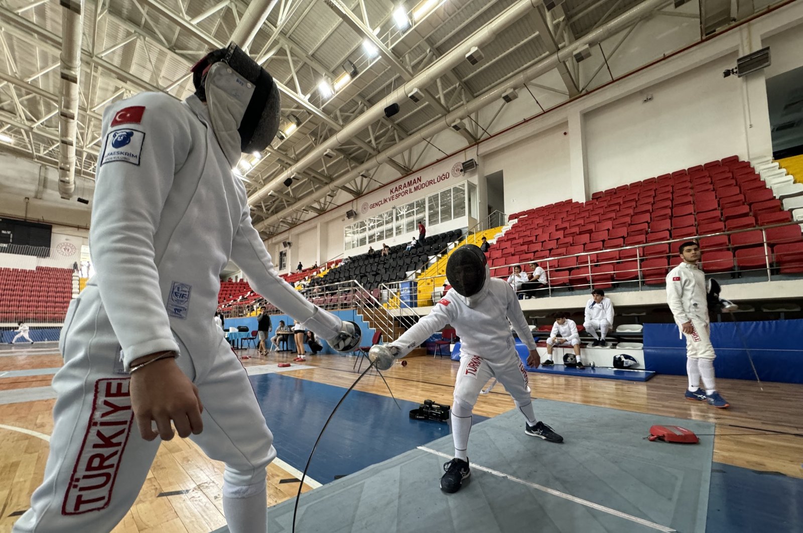 Turkish fencers Mert Ahmet Koç (L) and Alaz Güney Karakaş train for the Turkish School Sports Fencing Championships, Karaman, Türkiye, May 15, 2024. (AA Photo)