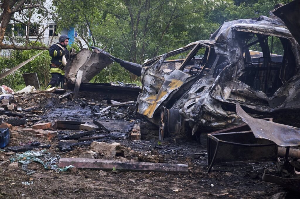 Ukrainian rescuers work at the site of a shelling of a residential area in Kharkiv, Ukraine, May 14, 2024. (EPA Photo)