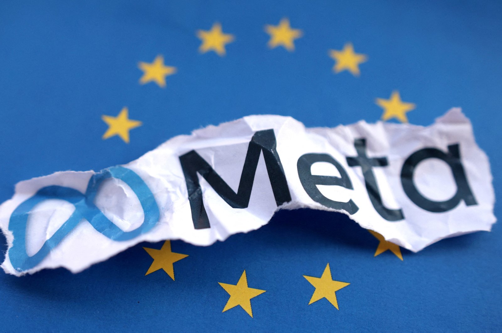 The EU flag and Meta logo are seen in this illustration taken May 22, 2023. (Reuters Photo)