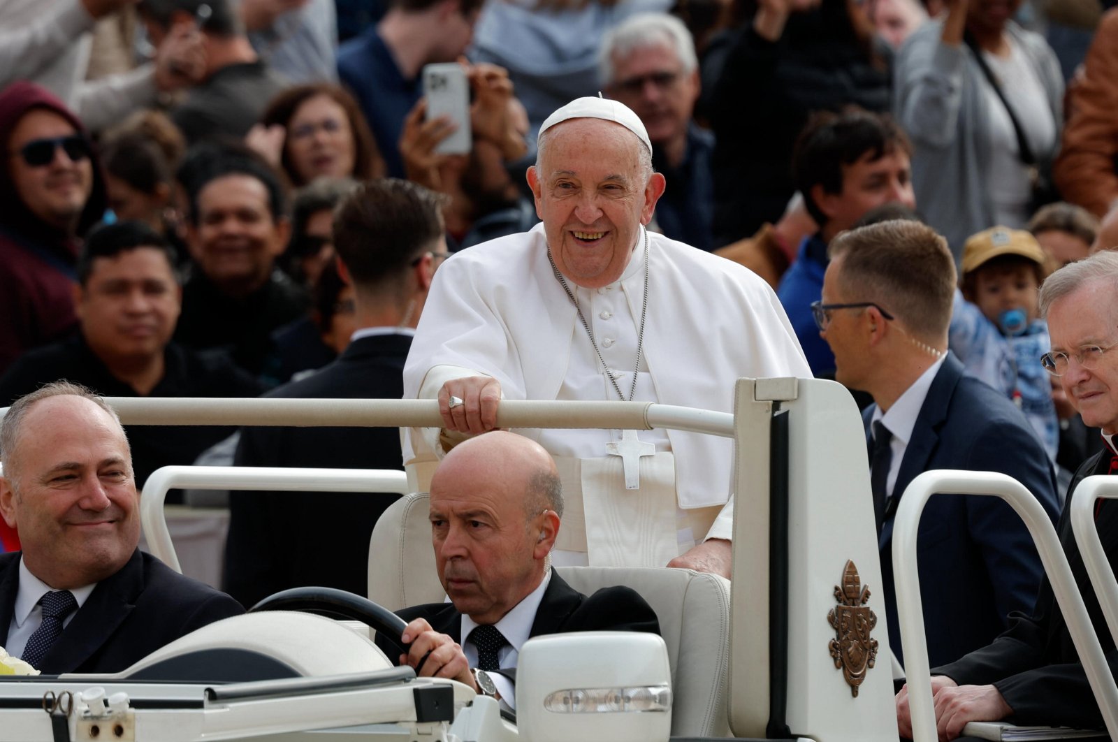 Pope Francis greets people on the occasion of the weekly general audience in St. Peter's Square, Vatican City, May 8, 2024. (EPA Photo)