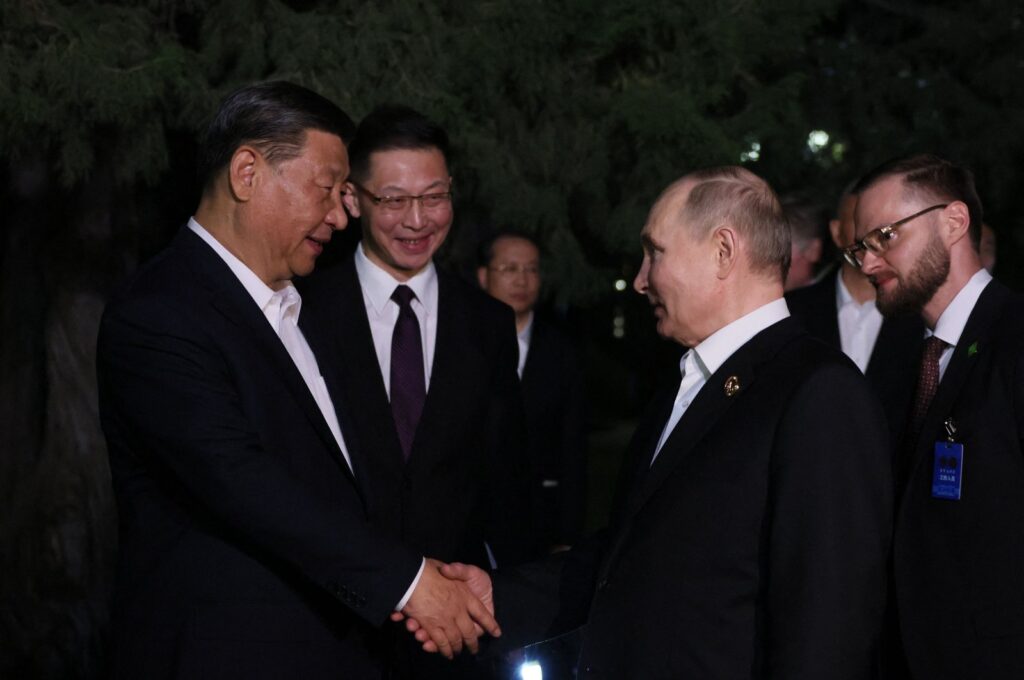 China's President Xi Jinping (L) and Russia's President Vladimir Putin shake hands after their talks, Beijing, China, May 16, 2024. (AFP Photo)
