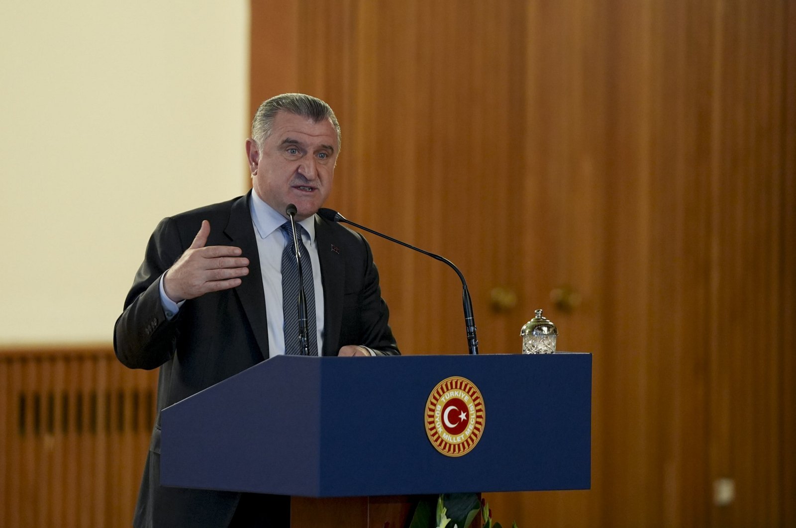 Youth and Sports Minister Osman Aşkın Bak speaks at Parliament, Ankara, Türkiye, May 17, 2024. (AA Photo)