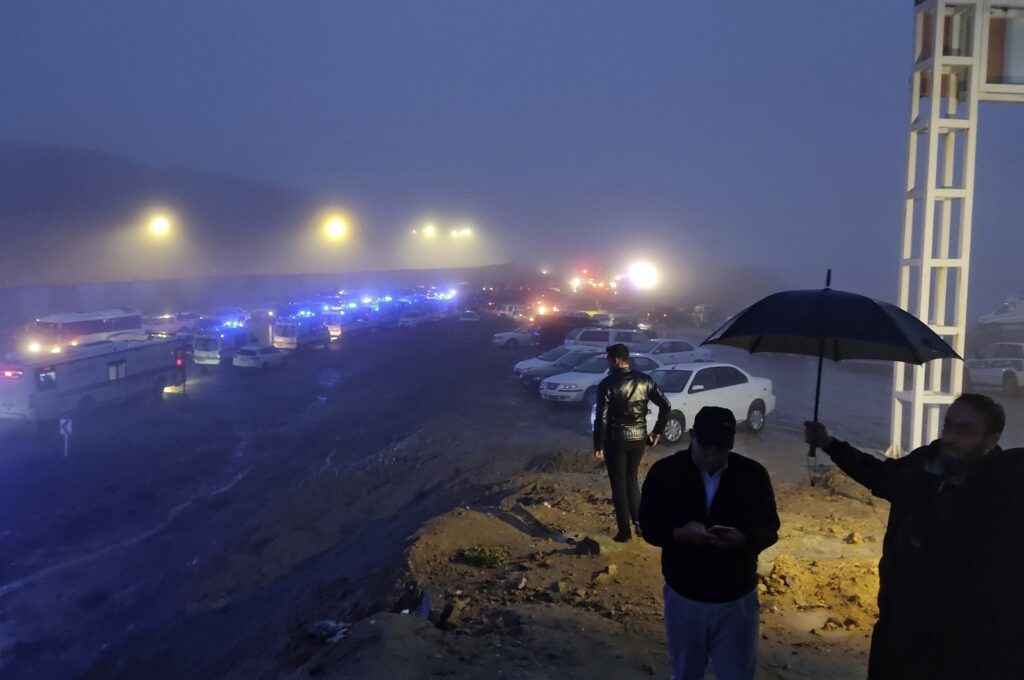 In this photo provided by Moj News Agency, rescue teams' vehicles are seen near the site of the incident of the helicopter carrying Iranian President Ebrahim Raisi in Varzaghan in northwestern Iran, Sunday, May 19, 2024. (Azin Haghighi/Moj News Agency via AP)