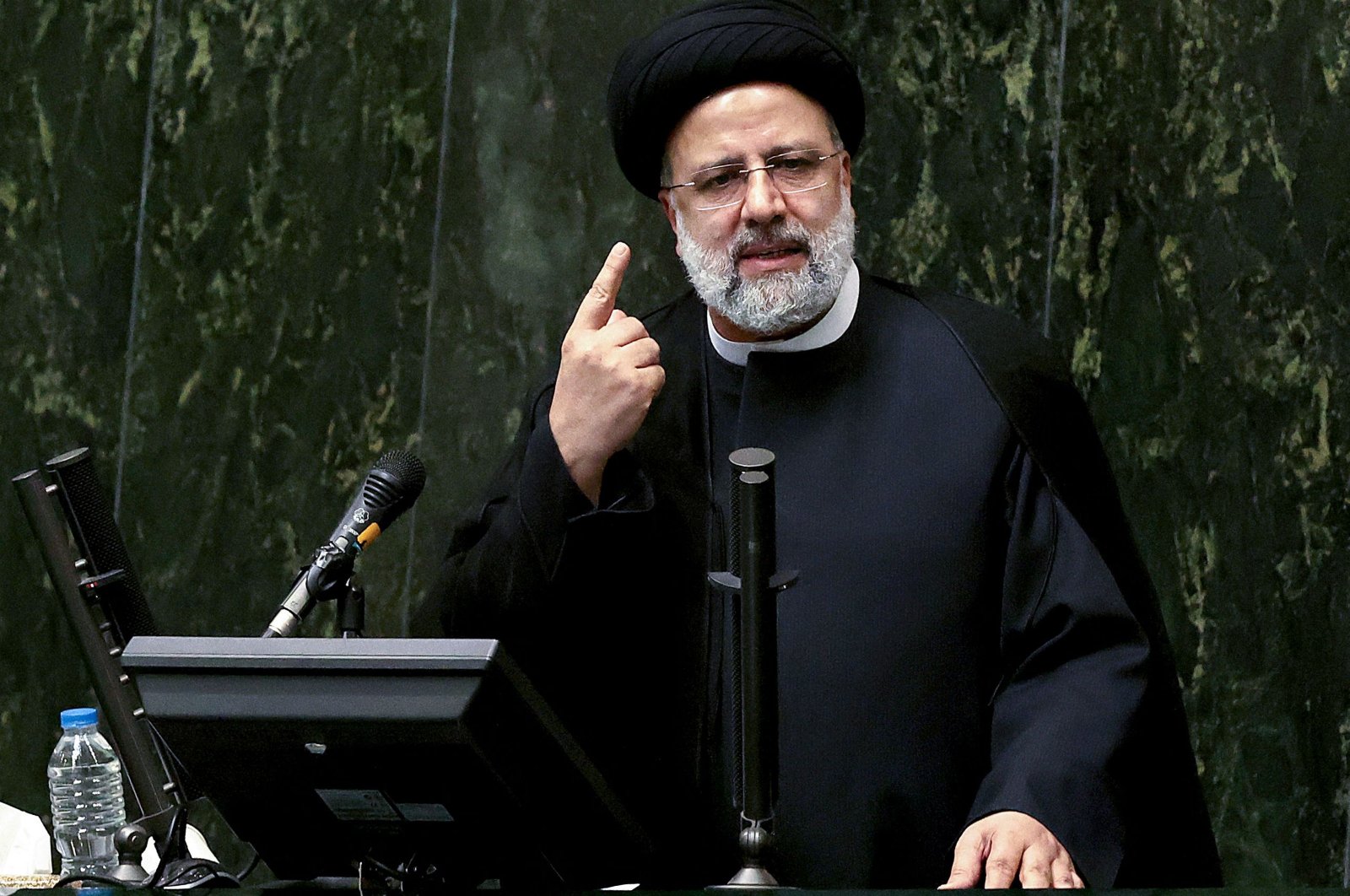 Iran's President Ebrahim Raisi speaks before parliament in the capital Tehran, Iran, August 25, 2021. (AFP Photo)