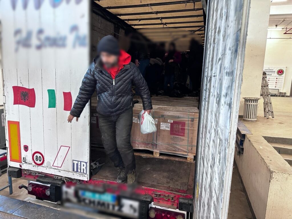 An irregular migrant caught on X-ray steps out of a truck headed for Greece, in northwestern Edirne province, Türkiye, Feb. 27, 2024. (IHA Photo)
