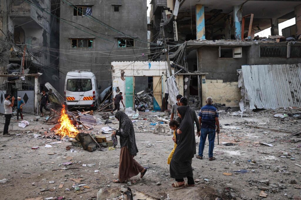 Palestinians look at the rubble of a family house that was hit overnight by Israeli bombardment in the Tal al-Sultan neighborhood, Rafah in southern Gaza, Palestine, May 20, 2024. (AFP Photo)