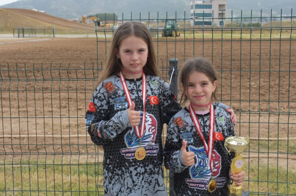 Turkish sisters Melisa (L) and Mimoza Mete pose for a photo at the Afyonkarahisar Motorsports Center, Afyonkarahisar, Türkiye, May 21, 2024. (AA Photo)