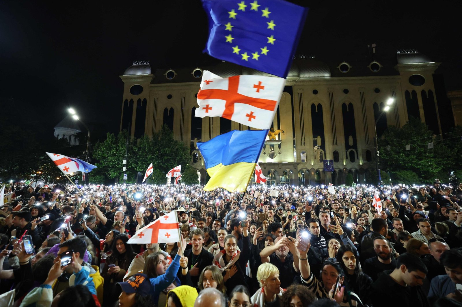 Protesters rally against the foreign influence law outside Georgia's Parliament in Tbilisi, Georgia, May 15, 2024. (AFP Photo)