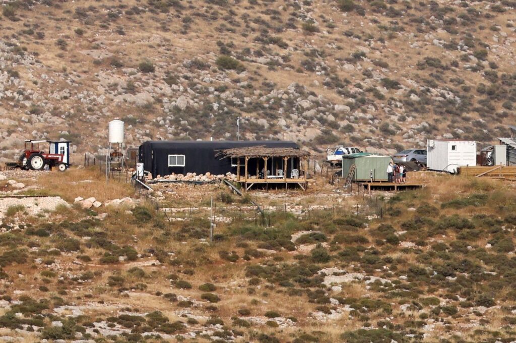 An Israeli settler outpost stands on a hilltop near the Palestinian village of Deir Jarir, east of the occupied West Bank city of Ramallah, Palestine, April 25, 2024. (AFP Photo)