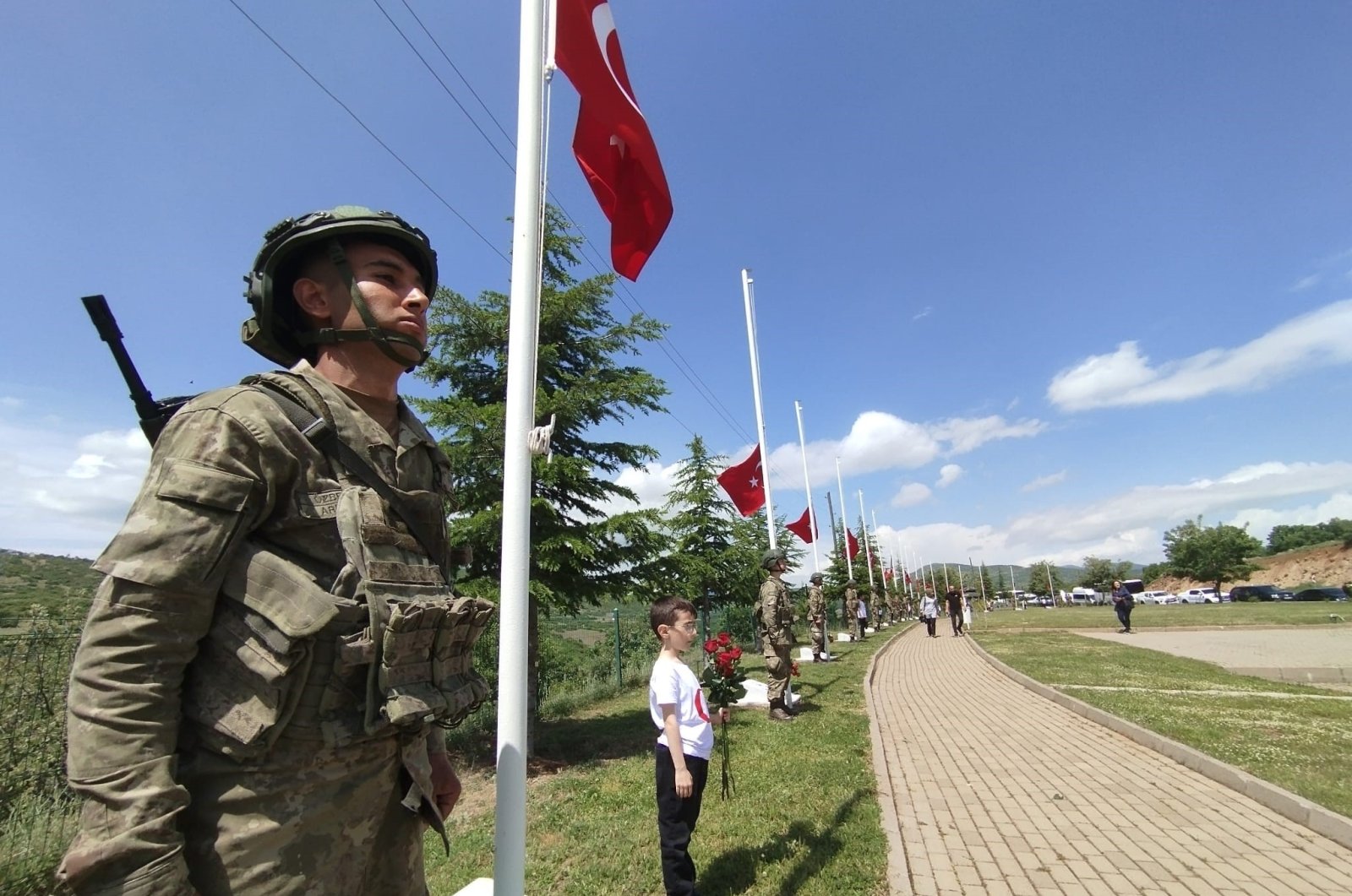 Soldiers and civilians attend a commemoration ceremony for 33 soldiers killed by PKK in 1993 in Bingöl, eastern Türkiye. (İHA Photo)