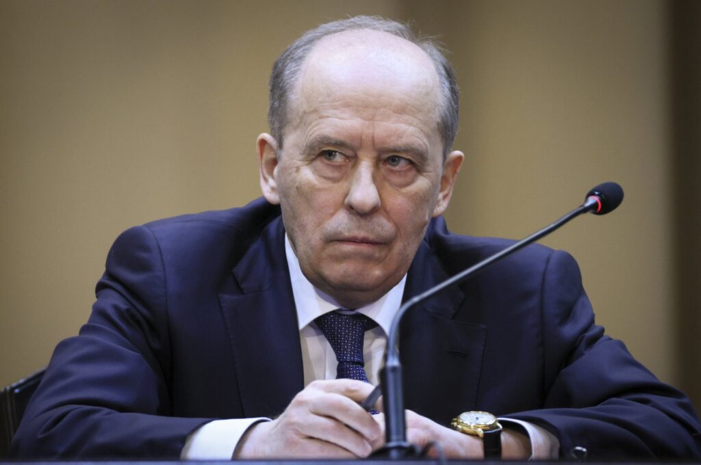 Federal Security Service (FSB) director Alexander Bortnikov listens as Russian President Vladimir Putin delivers his speech during a meeting of the Federal Security Service (FSB) board in Moscow, Russia, Tuesday, Feb. 28, 2023. (Sputnik, Kremlin Pool Photo via AP)