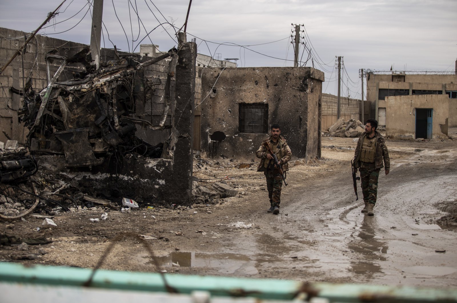 PKK/YPG terrorists patrol in Hassakeh, Syria, Feb. 8, 2022. (AP Photo)