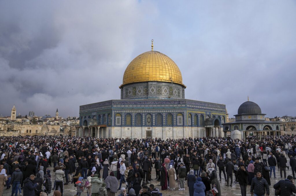 Palestinians gather for Eid al-Fitr prayers by the Dome of the Rock shrine in the Al-Aqsa Mosque compound in East Jerusalem's Old City, occupied Palestine, April 10, 2024. (AP Photo)