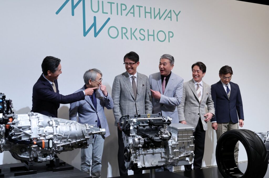 Subaru's CEO Atsushi Osaki, CTO Tetsuo Fujinuki, Toyota's CEO Koji Sato, CTO Hiroki Nakajima, Mazda's CEO Masahiro Moro and CTO Ichiro Hirose chat during a press conference pledging to each develop a new engine, Tokyo, Japan, May 28, 2024. (Reuters Photo)