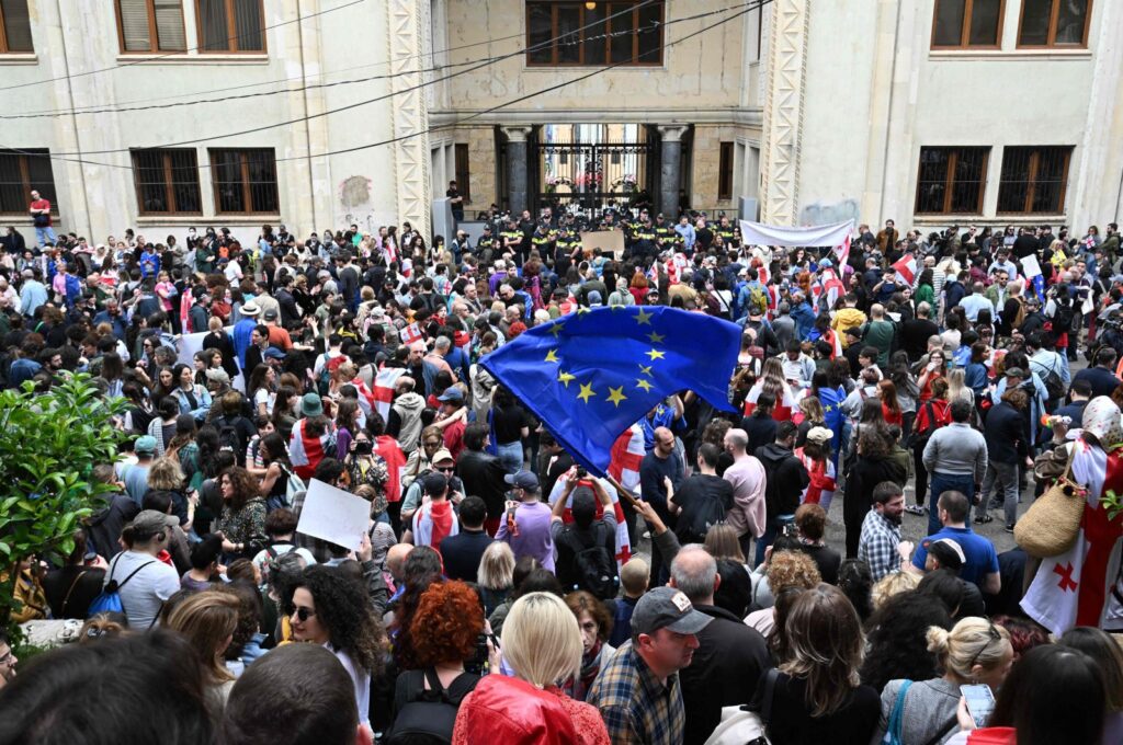 Demonstrators protesting the "foreign influence" law crowd outside the parliament building in central Tbilisi, May 28, 2024. (AFP Photo)