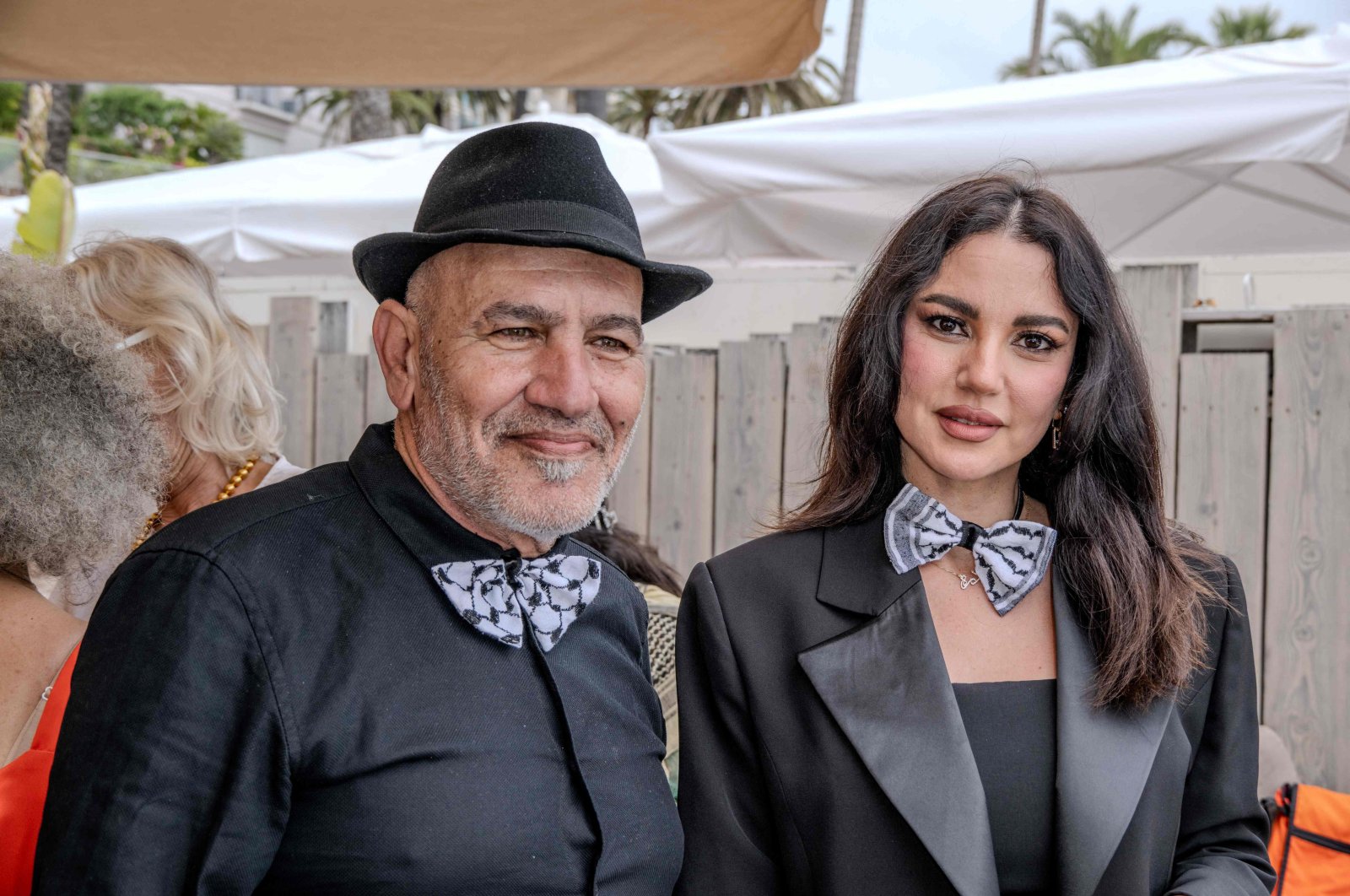 Palestinian film director Rashid Masharawi and Tunisian actor Dorra Zarrouk pose at an event to support Gaza to draw attention to the situation in Gaza and Israel, Cannes, France, May 20, 2024. (AFP Photo)