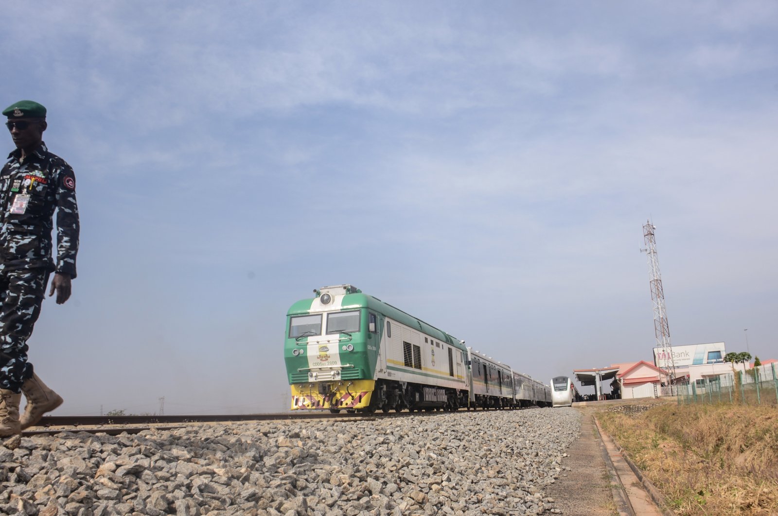 A police officer stands on guard at Rigasa railway station during a test run/planned resumption of the Abuja-Kaduna train services, Nigeria, Nov. 27, 2022. (Reuters Photo)