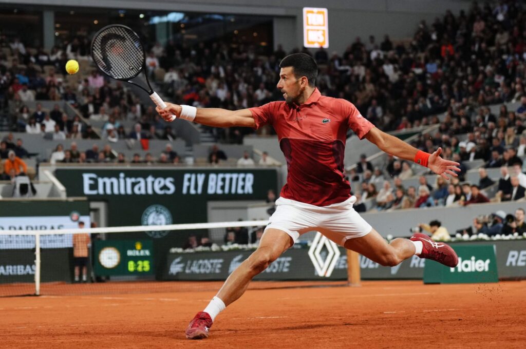 Serbia's Novak Djokovic plays a backhand return to Spain's Roberto Carballes Baena during their singles match on Day 5 of the French Open at Roland Garros, Paris, France, May 30, 2024. (AFP Photo)