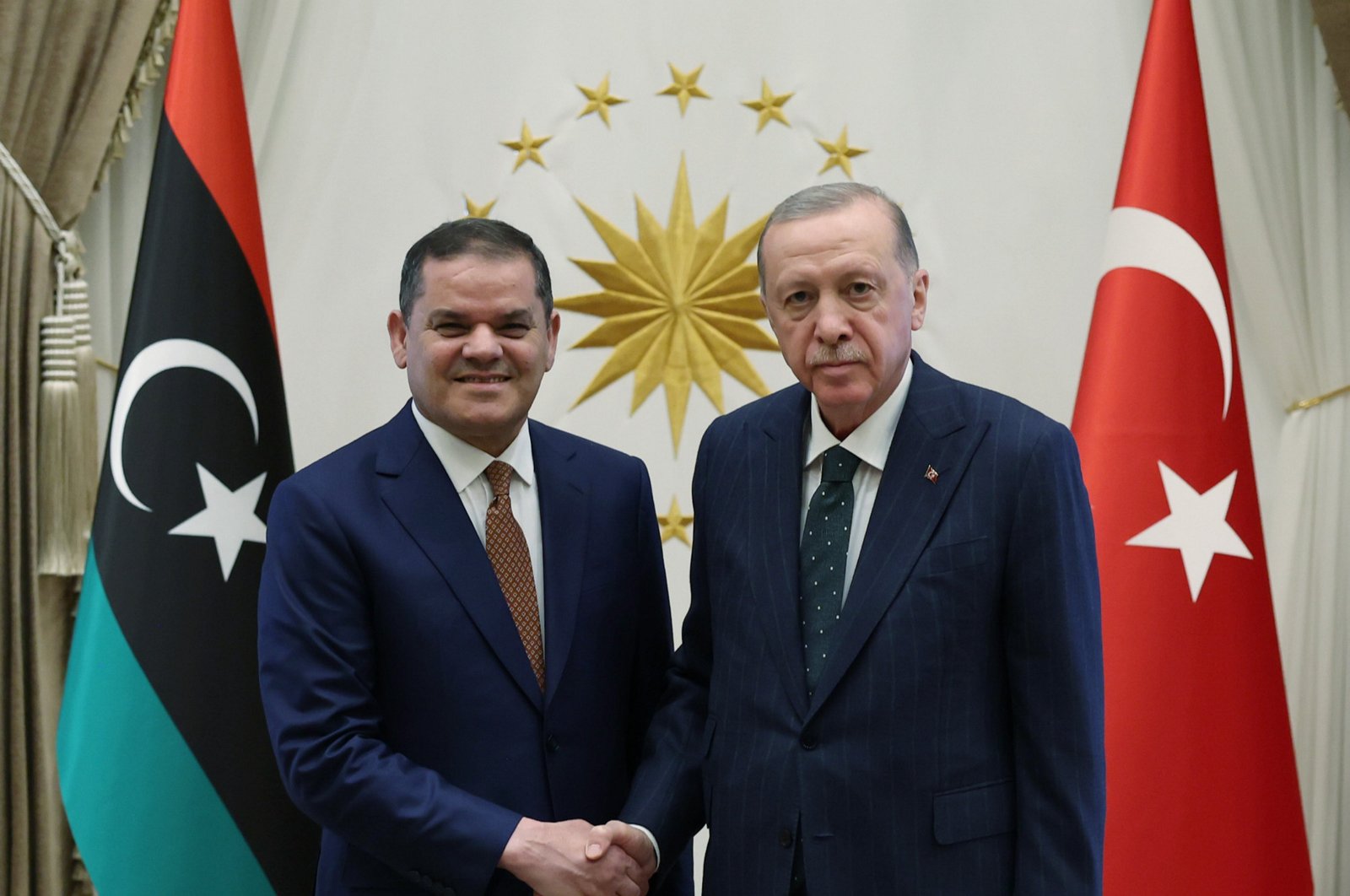 President Recep Tayyip Erdoğan and Libya's unity PM Abdul Hamid Dbeibah shake hands at the Presidential Complex in Ankara, May 31, 2024. (AA Photo)