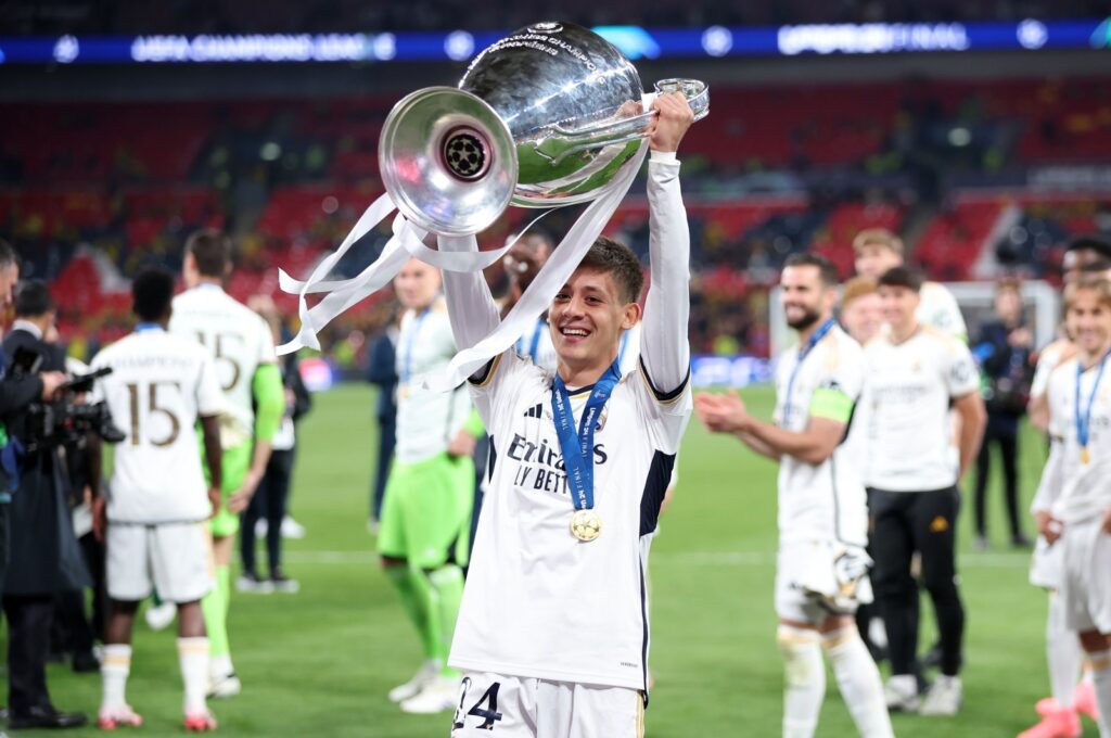 Real Madrid's Arda Güler celebrates with the trophy after winning the UEFA Champions League final match against Borussia Dortmund, London, U.K., June 1, 2024. (EPA Photo)