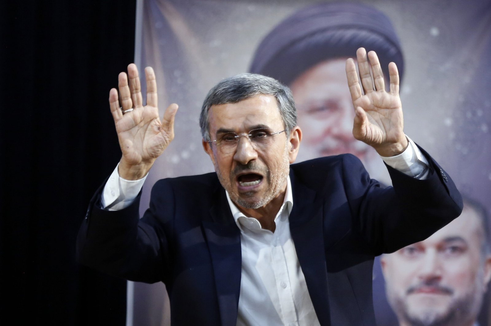 Former Iranian President Mahmoud Ahmadinejad greets the media after registering his candidacy in Tehran, Iran, June 2, 2024. (EPA Photo)
