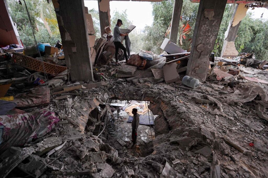Palestinians inspect the damage to a house after it was hit in an Israeli strike in al-Bureij camp in the central Gaza Strip, Palestine, June 3, 2024. (AFP Photo)