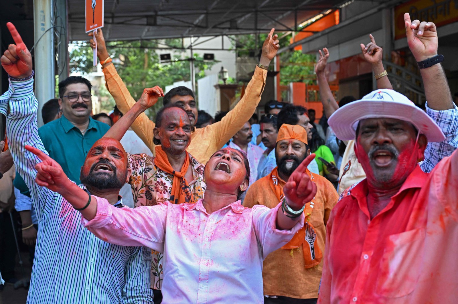 Members of the Hindu extremist Shiv Sena (UBT) party celebrate vote counting results for India's general election, in Mumbai, India, June 4, 2024. (AFP Photo)