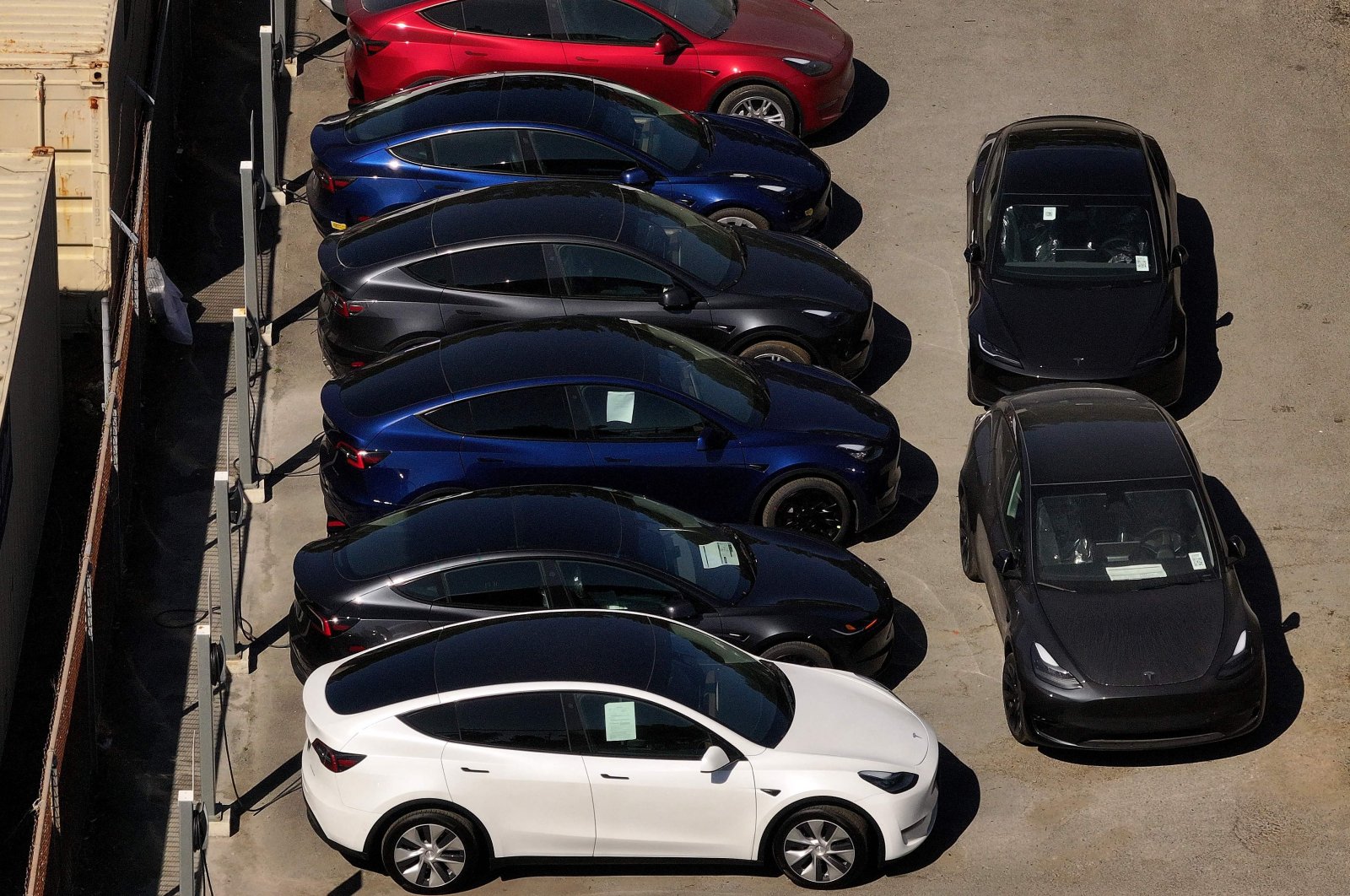 Brand new Tesla cars sit parked at a Tesla dealership in Corte Madera, California, U.S., May 31, 2024. (AFP Photo)