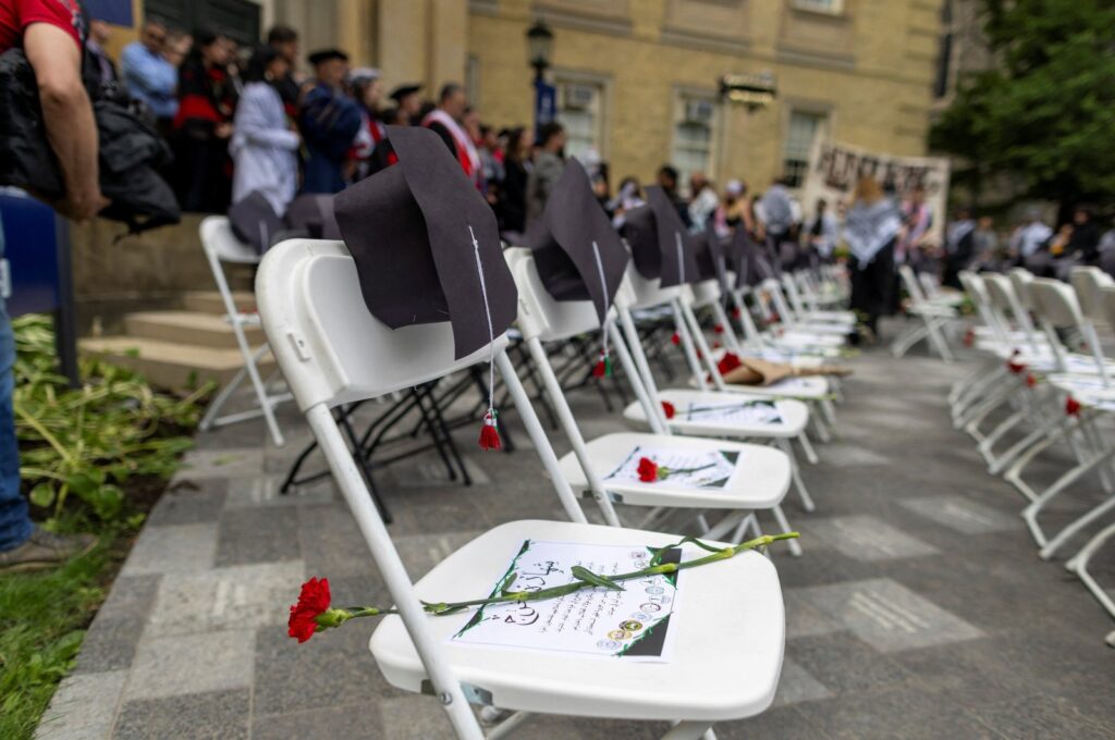 View of empty chairs as pro-Palestinian protesters and their supporters hold a graduation ceremony in honor of students killed and injured by Israeli attacks in Gaza, near the encampment at the University of Toronto on their first day of convocation in Toronto, Ontario, Canada, June 3, 2024. (Reuters Photo)